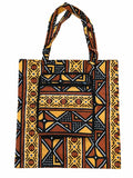 Cape Coast Amber small African-print shopping bag open in amber, rust, black and white