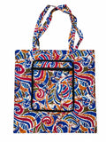 Elmina Swirl small African-print shopping bag, open, with blue and red swirls and orange and olive accents